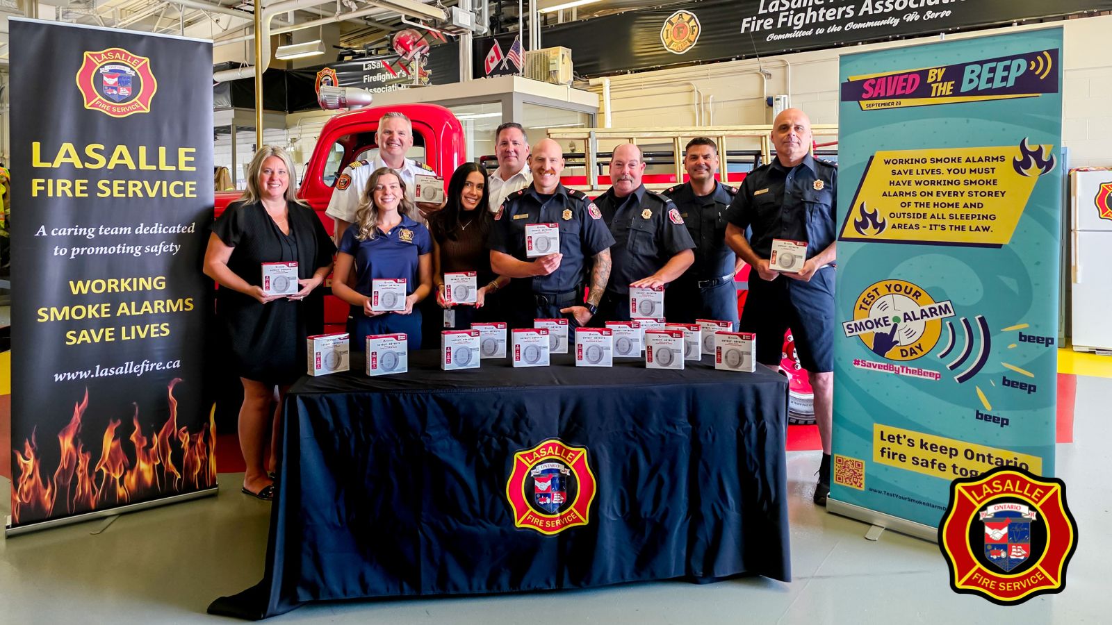 people holding smoke alarms
