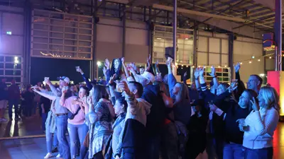 Crowd cheering at the LaSalle Event Centre.