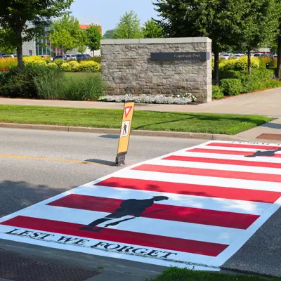 Red and white Veteran crosswalk.