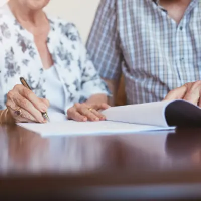 Photo of signing a documt