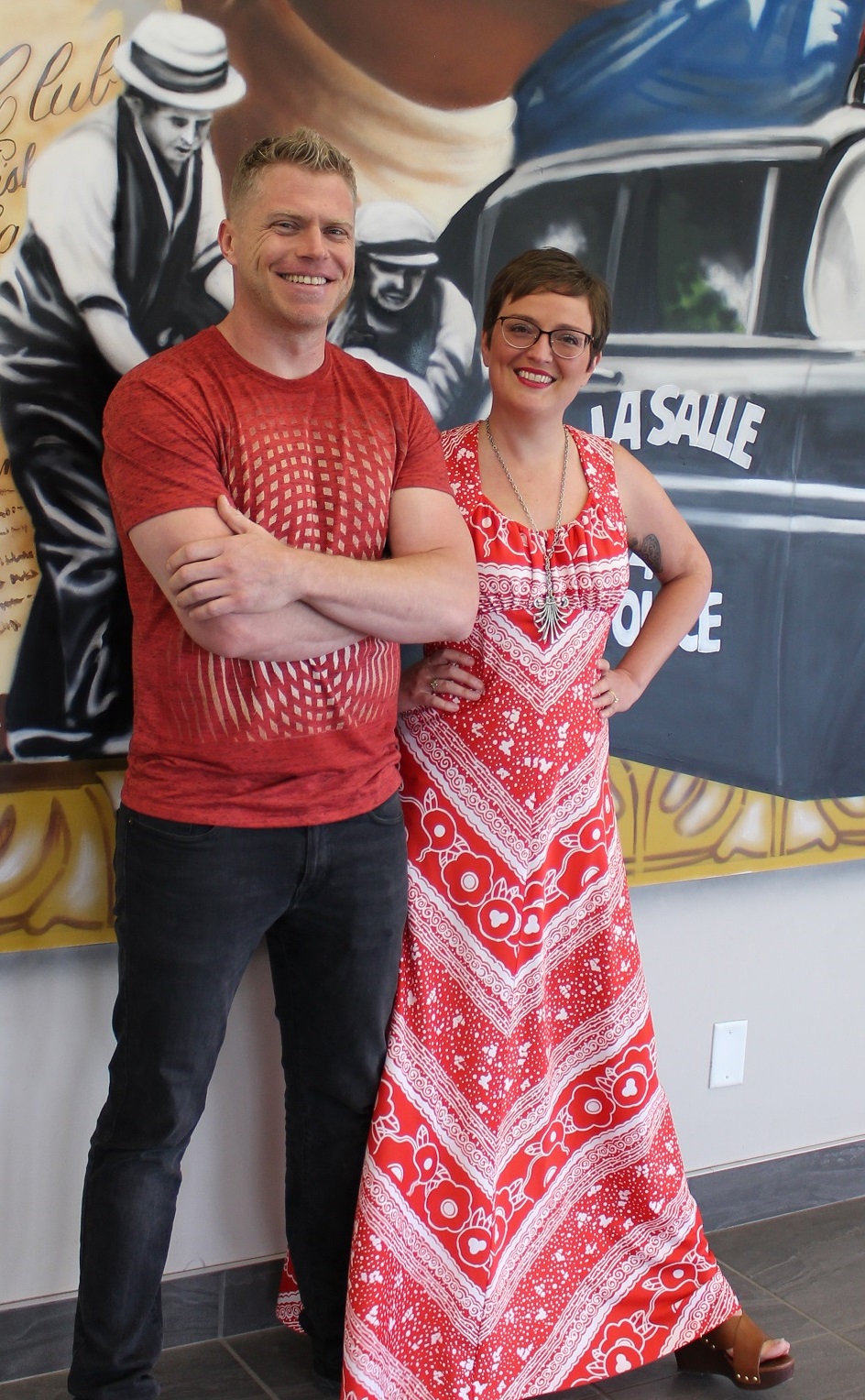Artists David Creed & Christy Litster in front of their mural