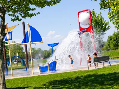 Children enjoying water activities at the splash pad.